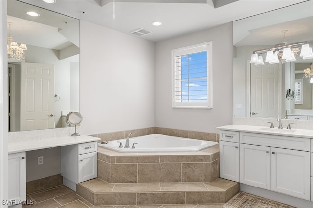 14270 Royal Harbour Ct Unit 920, Fort Myers, FL 33908 - bathroom with a chandelier, vanity, a garden tub, and tile patterned flooring