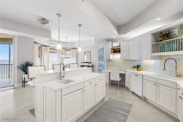 14270 Royal Harbour Ct Unit 920, Fort Myers, FL 33908 - kitchen featuring white dishwasher, a sink, open shelves, tasteful backsplash, and recessed lighting