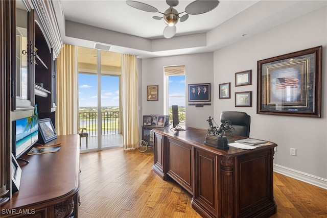 14270 Royal Harbour Ct Unit 920, Fort Myers, FL 33908 - office space featuring ceiling fan, baseboards, and light wood-style floors