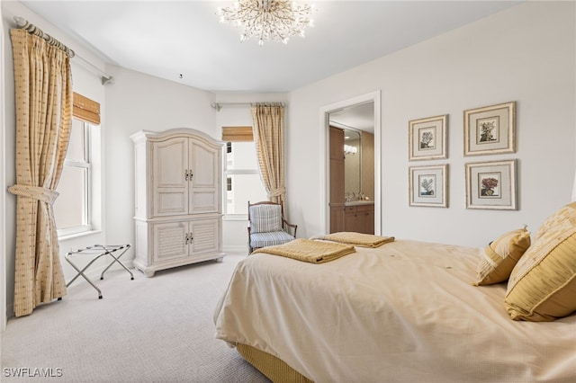 14270 Royal Harbour Ct Unit 920, Fort Myers, FL 33908 - bedroom featuring light colored carpet, a chandelier, ensuite bathroom, and baseboards