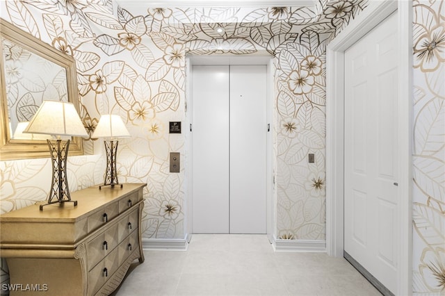 14270 Royal Harbour Ct Unit 920, Fort Myers, FL 33908 - corridor featuring wallpapered walls, elevator, and baseboards