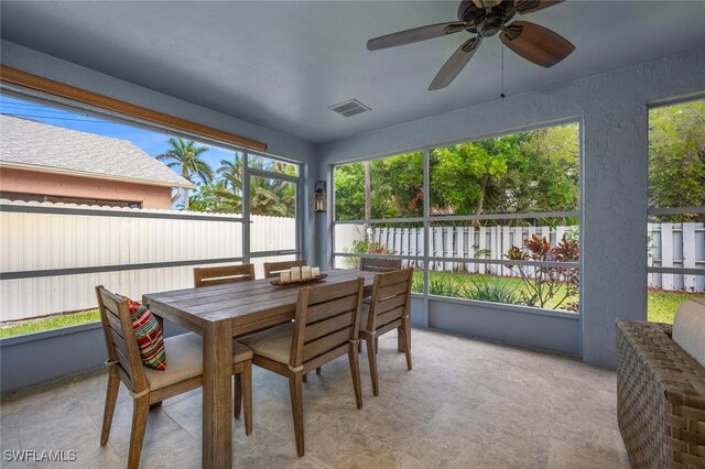 607 92nd Ave N, Naples, FL 34108 - sunroom featuring a ceiling fan, outdoor dining space, and healthy amount of natural light