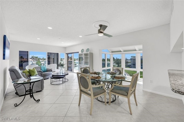 255 Park Shore Dr Unit 3-341, Naples, FL 34103 - dining room featuring a textured ceiling, light tile patterned floors, recessed lighting, baseboards, and a ceiling fan