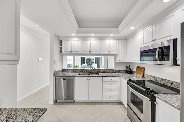 255 Park Shore Dr Unit 3-341, Naples, FL 34103 - kitchen featuring stainless steel appliances, a sink, white cabinets, light tile patterned floors, and stone counters