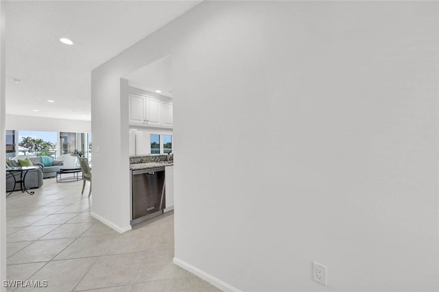 255 Park Shore Dr Unit 3-341, Naples, FL 34103 - corridor with light tile patterned floors, recessed lighting, and baseboards