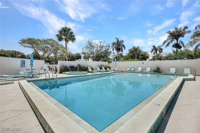 255 Park Shore Dr Unit 3-341, Naples, FL 34103 - community pool featuring fence, a patio area, and a hot tub