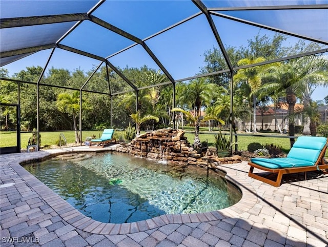13708 Collina Ct, Estero, FL 33928 - outdoor pool with a patio area, a yard, and a lanai