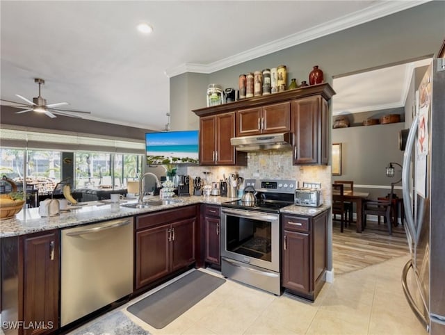 13708 Collina Ct, Estero, FL 33928 - kitchen featuring appliances with stainless steel finishes, a sink, under cabinet range hood, ornamental molding, and ceiling fan