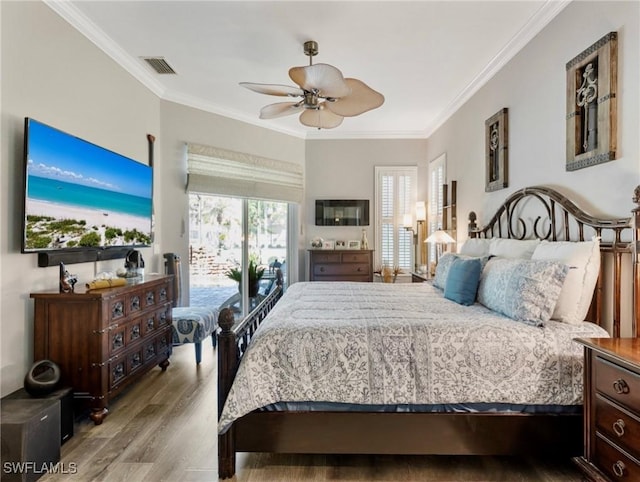 13708 Collina Ct, Estero, FL 33928 - bedroom featuring wood finished floors, ornamental molding, and a ceiling fan