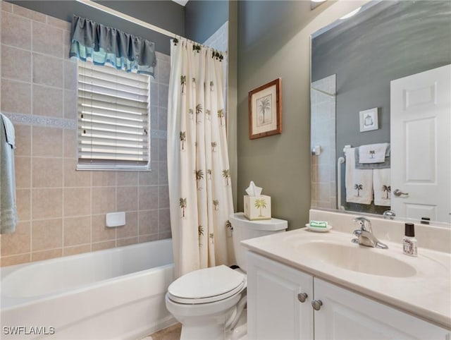 13708 Collina Ct, Estero, FL 33928 - bathroom with toilet, vanity, and shower / tub combo