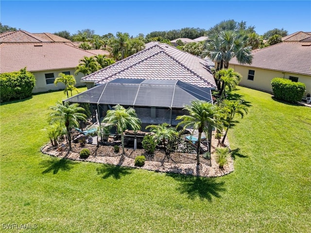 13708 Collina Ct, Estero, FL 33928 - view of grassy yard with glass enclosure