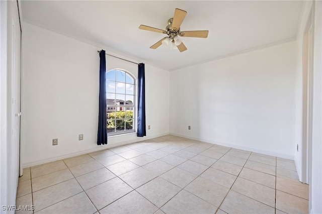 227 Manasota St, Fort Myers, FL 33913 - spare room with a ceiling fan, light tile patterned floors, and baseboards