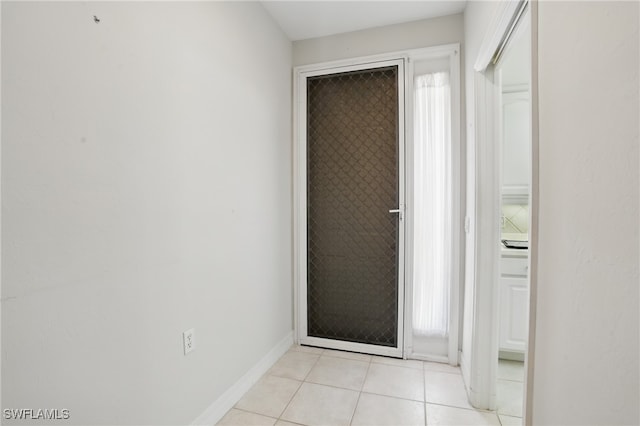 8380 Big Acorn Cir Unit 12A, Naples, FL 34119 - entryway featuring light tile patterned floors and baseboards