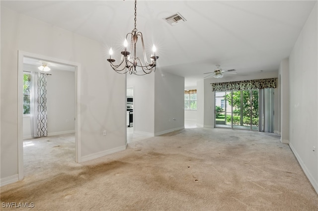 8380 Big Acorn Cir Unit 12A, Naples, FL 34119 - empty room with healthy amount of natural light, light colored carpet, and a chandelier