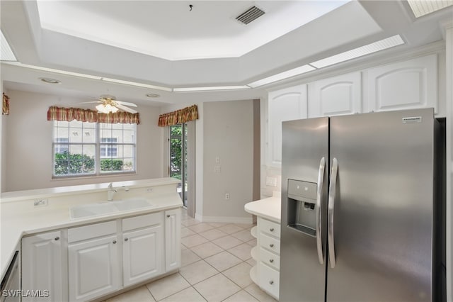 8380 Big Acorn Cir Unit 12A, Naples, FL 34119 - kitchen featuring stainless steel fridge with ice dispenser, a sink, light tile patterned floors, and a tray ceiling