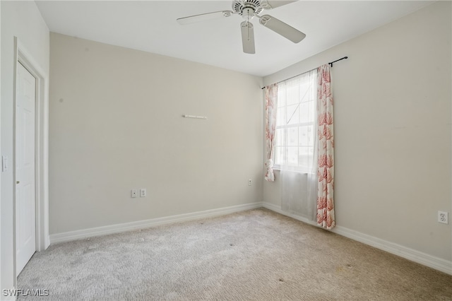 8380 Big Acorn Cir Unit 12A, Naples, FL 34119 - unfurnished bedroom with carpet flooring, baseboards, and a ceiling fan