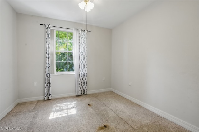 8380 Big Acorn Cir Unit 12A, Naples, FL 34119 - unfurnished room featuring carpet floors and baseboards