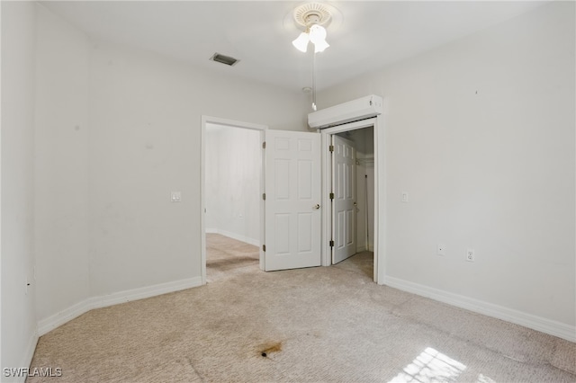 8380 Big Acorn Cir Unit 12A, Naples, FL 34119 - unfurnished bedroom featuring carpet floors and baseboards