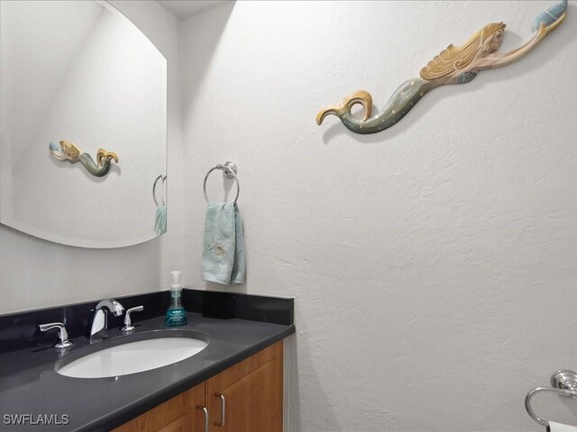 112 Marco Villas Dr Unit U2, Marco Island, FL 34145 - bathroom featuring vanity