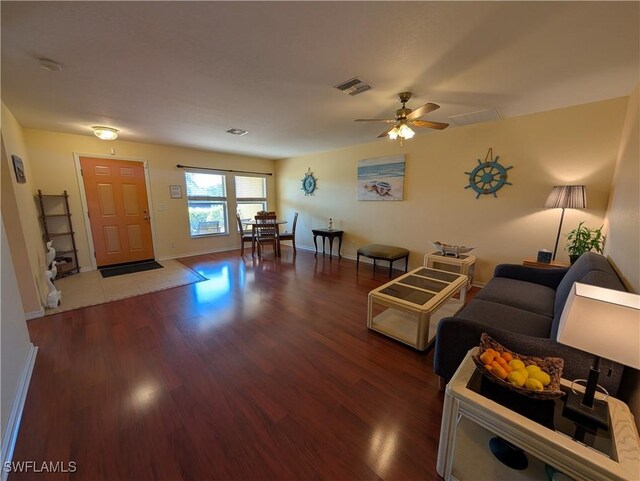 212 NW 26th Ave, Cape Coral, FL 33993 - living room with wood finished floors, ceiling fan, and baseboards