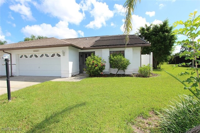 20061 Petrucka Cir N, Lehigh Acres, FL 33936 - single story home with an attached garage, concrete driveway, a front lawn, and stucco siding