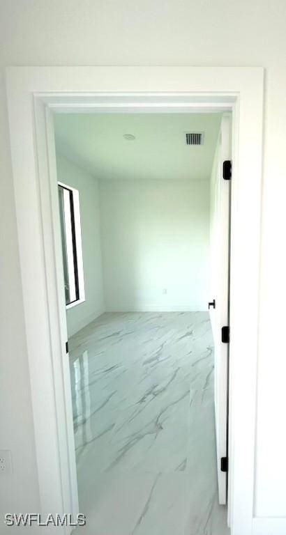 1218 Eclat St E, Lehigh Acres, FL 33974 - hall with marble finish floors