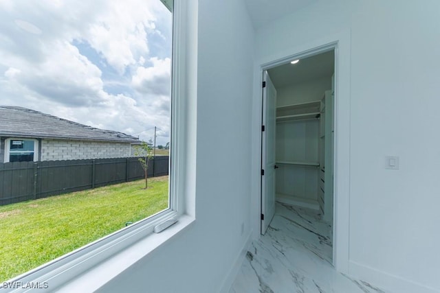 341 NE 31st Ter, Cape Coral, FL 33909 - hall featuring marble finish floors and baseboards