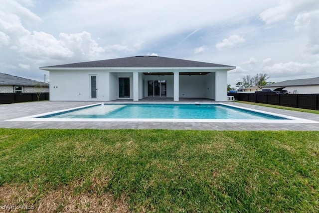 341 NE 31st Ter, Cape Coral, FL 33909 - back of house featuring stucco siding and a patio area