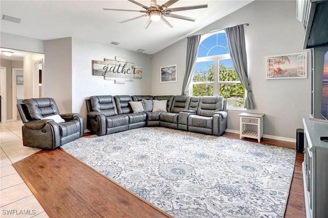 2128 SW 8th Ct, Cape Coral, FL 33991 - living room featuring ceiling fan, baseboards, and high vaulted ceiling