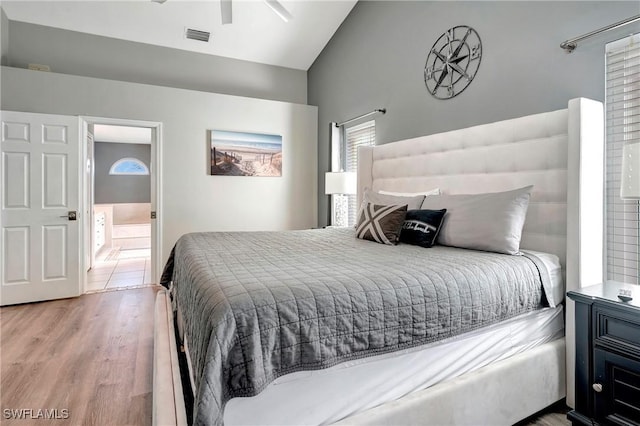 2128 SW 8th Ct, Cape Coral, FL 33991 - bedroom with vaulted ceiling and wood finished floors