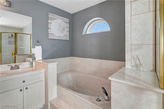 2128 SW 8th Ct, Cape Coral, FL 33991 - full bathroom with a stall shower, a garden tub, and vanity
