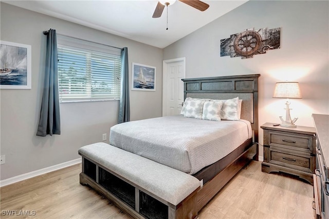 2128 SW 8th Ct, Cape Coral, FL 33991 - bedroom with vaulted ceiling, light wood-type flooring, baseboards, and a ceiling fan