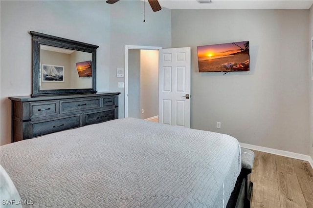 2128 SW 8th Ct, Cape Coral, FL 33991 - bedroom with light wood-style flooring, baseboards, and a ceiling fan