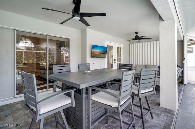 2128 SW 8th Ct, Cape Coral, FL 33991 - view of patio with a ceiling fan, french doors, and outdoor dining area