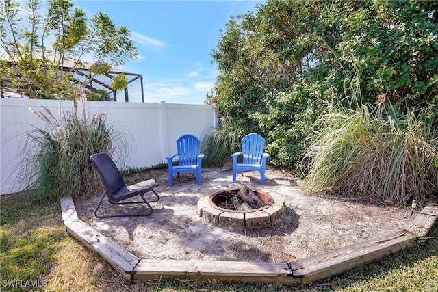 2128 SW 8th Ct, Cape Coral, FL 33991 - view of patio featuring an outdoor fire pit