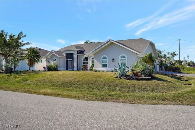 2128 SW 8th Ct, Cape Coral, FL 33991 - ranch-style house featuring a front lawn and stucco siding