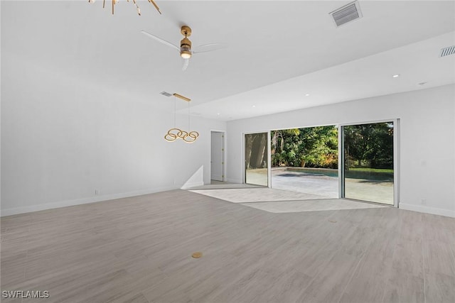 4440 15th Ave SW, Naples, FL 34116 - empty room featuring light wood-style floors, baseboards, a ceiling fan, and recessed lighting
