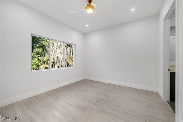 4440 15th Ave SW, Naples, FL 34116 - spare room with a ceiling fan, baseboards, recessed lighting, and light wood-style floors