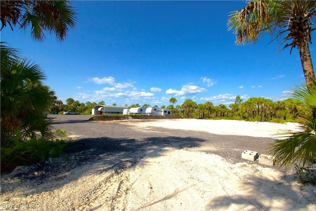 2640 36th Ave SE, Naples, FL 34117 - view of dirt / gravel road