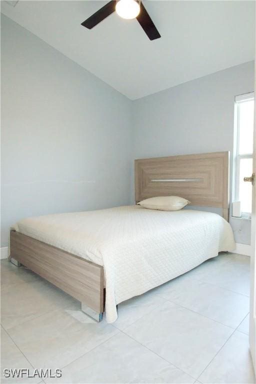 2640 36th Ave SE, Naples, FL 34117 - bedroom featuring a ceiling fan and light tile patterned floors