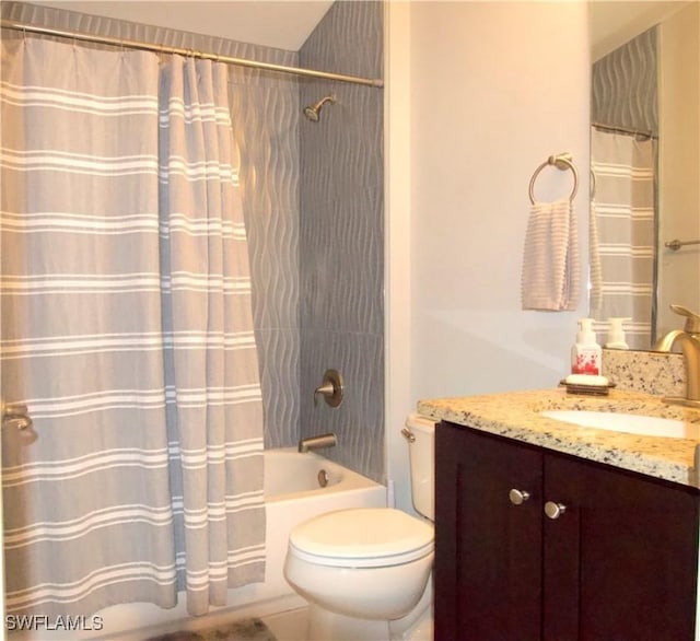 2640 36th Ave SE, Naples, FL 34117 - full bathroom with vanity, toilet, and shower / tub combo
