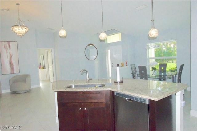 2640 36th Ave SE, Naples, FL 34117 - kitchen featuring stainless steel dishwasher, a sink, high vaulted ceiling, baseboards, and light stone countertops