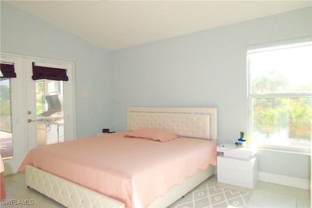 2640 36th Ave SE, Naples, FL 34117 - bedroom featuring lofted ceiling, baseboards, french doors, and access to outside