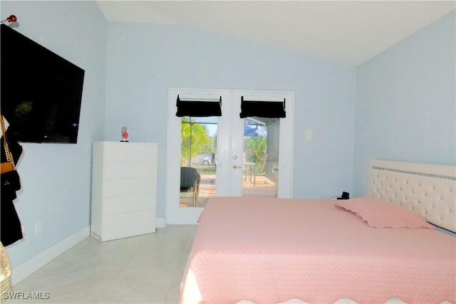 2640 36th Ave SE, Naples, FL 34117 - bedroom featuring lofted ceiling, access to outside, french doors, and baseboards