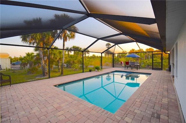 2640 36th Ave SE, Naples, FL 34117 - swimming pool with a patio and glass enclosure