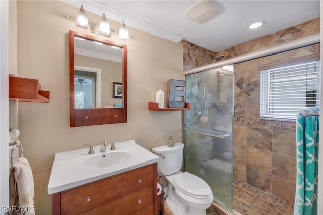 240 Palm River Blvd Unit C202, Naples, FL 34110 - full bathroom featuring a shower stall, toilet, ornamental molding, and vanity