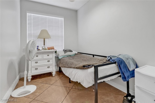4617 Lombardy Ln, Naples, FL 34112 - tiled bedroom with baseboards