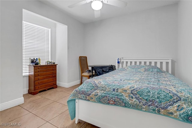 4617 Lombardy Ln, Naples, FL 34112 - bedroom with light tile patterned floors, baseboards, and ceiling fan