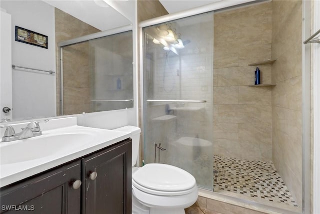 4617 Lombardy Ln, Naples, FL 34112 - bathroom featuring a shower stall, toilet, and vanity