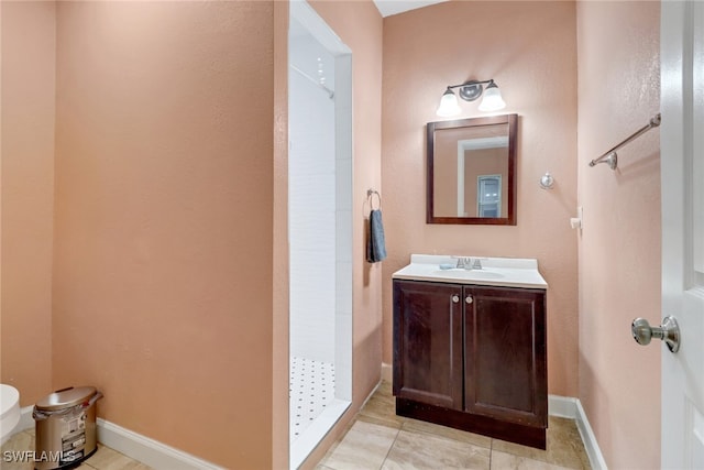 4617 Lombardy Ln, Naples, FL 34112 - full bath featuring a shower stall, vanity, toilet, tile patterned floors, and baseboards